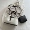 Nuevo conjunto de bolsos modelo de comercio exterior, bolso de hombro y bolso cruzado de moda de alta gama de gran capacidad en color vintage bloqueado