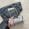 Bolsa de Axila Feminina 2025 com Laço Doce, Nova Moda Bolinhas Fofa Simples Bolsa de Ombro Tote Tendência