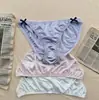 Comercio exterior transfronterizo Amazon tanga de seda helada sin costuras de cintura baja para mujer bragas con lazo cómodas transpirables de cintura baja