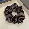Scrunchie de Veludo de Alta Qualidade com Diamantes Brilhantes para Mulheres, Elástico para Rabo de Cavalo Outono e Inverno, Acessório de Cabelo Versátil com Design de Gipsofila