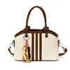 Yozzi 2026 principios de otoño nueva moda de moda bolso de hombro cruzado de gran capacidad, elegante bolso de mano tipo cubo para el trabajo