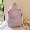 Mochila escolar que protege la columna vertebral para reducir la carga, ligera, ultraligera, duradera, para niños y niñas de primer grado, nuevo diseño simple