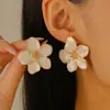 Europa y Estados Unidos nuevos pendientes de moda de gota de aceite de flor atmósfera femenina alto sentido pendientes de temperamento simple pendientes transfronterizos venta al por mayor