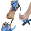 Sandalias azules impermeables de tacón de aguja alto para mujer, nuevas sandalias de tacón alto de verano 2026 con correa de perlas y lazo hueco para mujer