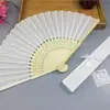 Comercio electrónico transfronterizo abanico femenino elegante más vendido 21cm abanico de boda abanico femenino caja hueca 14 colores opcionales