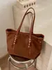 Bolso de mujer de gran capacidad, versátil, estilo preppy, negro, bolso tote de cuero suave para ir al trabajo, casual, bolso de moda transfronterizo