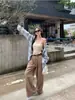 Chaqueta Camisera a Cuadros con Protección Solar para Mujer Verano 2025 Nuevo Diseño Francés Holgado Camisa Nicho