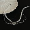 Collar de perlas con costura de lazo, diseño de nicho para mujer, estilo moderno, dulce y elegante, cadena de clavícula, accesorios de alta calidad.