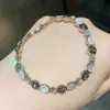 Pulsera de lujo ligero vintage con circonita redonda y nácar, de alta gama y versátil, nueva joyería de moda para celebridades de internet 2026