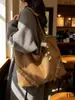 Bolsa de Ombro Transfronteiriça Casual de Grande Capacidade para Mulheres Nova Versátil para o Outono e Inverno Bolsa Tote para o Dia a Dia Bolsa Simples de Ombro