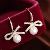 Pendientes de Aro con Lazo Perla Estilo Retro Francés para Mujer Celebridad de Internet Moda Dulce Versátiles Elegantes Elegantes Pendientes Joyería para Orejas de Moda