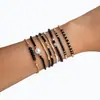 Pulsera de Moda para Mujer Tejida a Mano con Cuentas de Cristal Negro Curvadas y Cuentas de Arroz, Nuevo Set de Múltiples Piezas, Transfronterizo Europeo y Americano