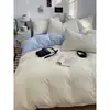 Juego de cuatro piezas estilo coreano minimalista con borde de concha en color liso, hecho de tela de algodón lavado, adecuado para la habitación doble de una niña, ropa de cama para todas las estaciones