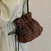 Bolso tipo cubo de alta gama, lujo ligero, vintage para mujer, nuevo modelo de otoño 2026, bolso de hombro de nicho para el día a día, bolso cruzado versátil