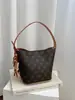 Bolso tipo cubo transfronterizo de alto valor, elegante, ligero, versátil para mujer, nuevo estampado retro 2026, bolso de hombro cruzado para el día a día