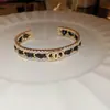 Pulseira Aberta de Couro Plissado Geometricamente Torcido Estampada de Leopardo Moda Transfronteiriça Pulseira Retrô Pulseira de Alto Padrão Europeia e Americana para Mulheres