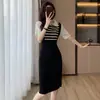 Comercio exterior ropa de mujer toma real vestido de dos piezas falsas a rayas estilo Hepburn para mujer cintura adelgazante verano polo falda larga 20