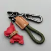 Llavero Colgante de Cachorro Bulldog Francés Lindo de Dibujos Animados Anillo para Llavero de Coche Colgante de Bolsa de Cuerda Tejida a Mano de Cuero