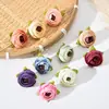 Flor de brote de té simulación transfronteriza flor de brote de hoja retro cabeza de flor de brote corsage tocado flor decorativa pequeños accesorios de camelia