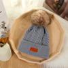 Suministro directo de fábrica gorro otoño e invierno con pompón niños y niñas estilo Han sombrero tejido dulce gorro cálido para bebé en stock