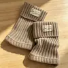 Polainas de punto cálidas y gruesas estilo JK japonés con etiqueta de tela, calcetines apilados de color liso con raya vertical, polainas cálidas y gruesas