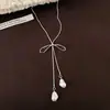 Colar Pingente Laço Pérola Estilo Coreano para Mulheres, Corrente Longa Decorativa Versátil para Suéter Outono e Inverno