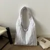 Bolsa Feminina para Comércio Exterior Transfronteiriço Verão 2026 Casual Nicho Doce com Laço Bolsa de Ombro Versátil Moda Bolsa de Braço