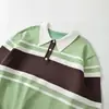 Comércio Exterior Roupas Femininas 2026 Moda Europeia e Americana Versátil Casual Simples Solto Bloco de Cores Listrado Tricô Top Feminino G866926