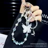 Cadena Colgante para Teléfono Móvil Mariposa Luminosa Cadena de Muñeca Tejida a Mano con Cuentas de Cristal Pujiang Cordón para Teléfono Móvil de Perla Venta al por Mayor