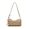 Bolso tipo almohada de piel de vaca de capa superior nuevo para mujer, bolso cilíndrico simple, bolso de hombro de cuero genuino, bolso cruzado ajustable, bolso pequeño para el día a día
