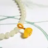 Pulsera Tejida a Mano de Calcedonia Amarilla Flor de Osmanthus Brote de Flor de Ágata Cuerda de Mano DIY Colgante Pequeño Venta al Por Mayor Nuevo Producto Verano 2024