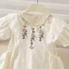 Vestido de Verão Feminino 2026 Vestido Floral Bordado Novo Estiloso Conjunto de Verão Infantil com Senso de Design