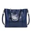 2023 nuevo bolso de moda europeo y americano para mujer bolso tote de cuero encerado de moda bolso de hombro simple para mujer una generación de pelo