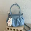 Bolso transfronterizo para mujer de gran capacidad, nuevo modelo 2026, bolso de hombro cruzado simple y elegante con lazo, bolso para el trabajo