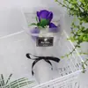 Temporada navideña de graduación transfronteriza ramo de jabón de 3 rosas y claveles caja de regalo de PVC transparente ramo mini de mano