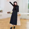 Conjunto da moda de duas peças personalizado, estilo novo para o início do outono de 2026, com colete e saia plissada inspirados na Chanel