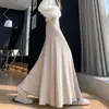 Foto real falda plisada de punto super bonita falda de invierno de longitud media para mujer otoño e invierno falda de cola de pez drapeada que se ajusta a la cadera falda larga petite