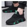 Otoño 2026 Nuevo Elástico Flyknit Transpirable Malla Negra Zapatos Casuales Suela Suave Ligeros Cómodos Tenis F99