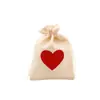 Suministro directo transfronterizo 10*14 bolsas de imitación de lino con corazón estilo occidental para boda bolsas de embalaje para dulces de boda bolsas de regalo con cierre de cordón bolsas de Navidad