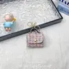 Nuevo Exquisito Mini Estuche para Auriculares Estilo Chanel, Colgante Mini Bolso Textil Colorido, Accesorio de Bolso Pequeño