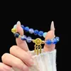 Pulsera de Bolas Dopamina de Verano para Mujer, con un Diseño Fresco y Dulce, Borlas Florales, Sensación de Alta Gama, Pulsera Versátil