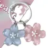 J89 Llavero Lindo Dulce Gelatina Flor de Cerezo Ins Mejor Amigo Pareja Regalo Estudiante Mochila Colgante Accesorios