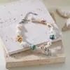 Europa e Estados Unidos transfronteiriço novo rabo de peixe concha contas de arroz pulseira praia estrela-do-mar pingente concha cristal contas pulseira atacado