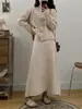 Nuevo Conjunto de Dos Piezas para Mujer Otoño e Invierno 2025: Cárdigan Suéter con Flor Estéreo Francesa + Falda de Punto Ajustada de Cintura Alta