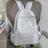 Mochila Escolar Estilo Novo para Estudante, Mochila Multifuncional da Moda de Grande Capacidade, Design de Nicho com Desenhos Animados, Mochila Leve e Versátil para Mulheres