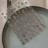 Pegatinas de arte de uñas blancas con diseño de cruz retro metálico y2k de chica picante, en relieve 3D, decoraciones de uñas DIY de alta gama, plateado