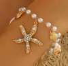 Pulsera Colgante de Estrella de Mar, Caracola y Perla de Nueva Moda Transfronteriza Europea y Americana Joyería de Mano Más Vendida para Vacaciones en la Playa