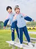 Uniforme Escolar para Alunos do Ensino Fundamental Primavera e Outono Novo Conjunto de Três Peças Roupas para Aula de Esportes de Primeira Série Verão Estilo Universitário Roupas para Jardim de Infância
