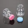 Suministro profesional botella de plástico PET transparente tipo calabaza de 32 bocas botella de caramelo de boca ancha sellada botella de empaque de alimentos al por mayor