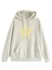 Amazon eBay sitio independiente moda casual versátil sudadera con capucha holgada de mujer con rayas amarillas y estrellas para comercio exterior